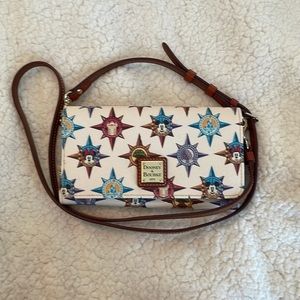 Gently used Disney Dooney & Bourke crossbody wallet